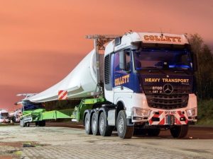 COLLETT  MERCEDES-BENZ AROCS SLT BIGSPACE 8X4 WITH NOOTEBOOM SUPER WING CARRIER