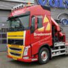BREDENOORD; VOLVO FH4 GLOBETROTTER 8X2 RIGED TRUCK FLAT BED + PALFINGER PK 65002 SH